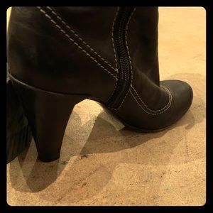 Marc Jacobs, chic, black 3” heel, black boots.